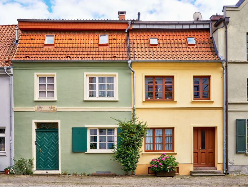 posso construir colado no muro do vizinho​